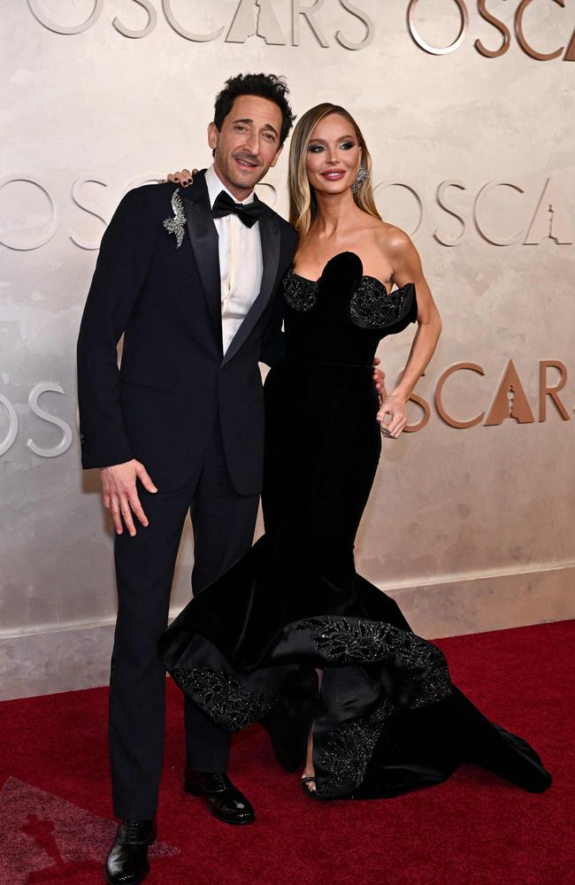 Adrien Brody and Georgina Chapman. Picture: ANGELA WEISS / AFP