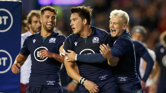 EDINBURGH, SCOTLAND - SEPTEMBER 06: Sam Johnson of Scotland (centre) scores try during the international match between Scotland and Georgia at Murrayfield on September 6, 2019 in Edinburgh, United Kingdom. (Photo by Robert Perry/Getty Images)