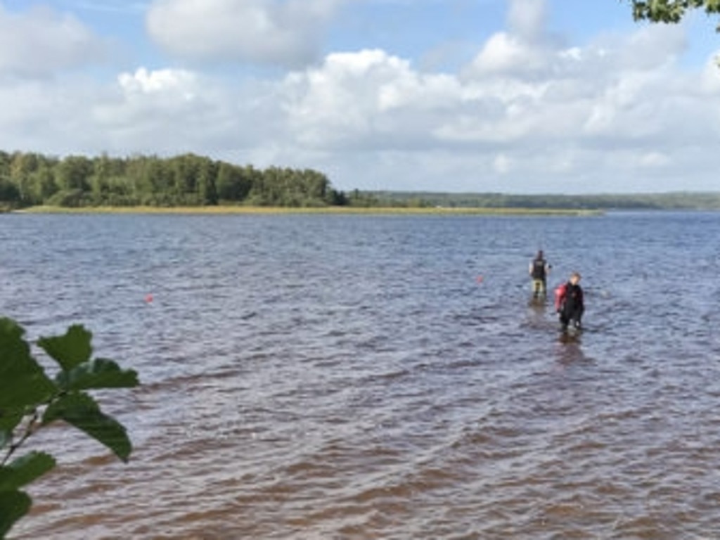 With the help of metal detectors and divers the search site is searched. Picture: Supplied