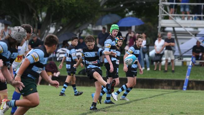 Day 1 of the King of the Country junior rugby union tournament at the Gold Coast Eagles Rugby Union Club.Maroochydore Swans (BLUE AND BLACK) vs USQ Saints (Blue ) Maroochydore Player No USQ Player No Pic Mike Batterham