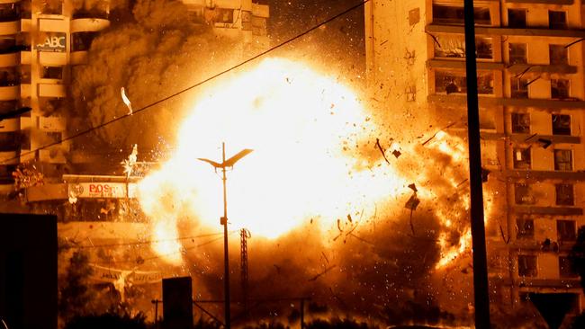 A view shows the moment of an Israeli strike on a building, amid the ongoing hostilities between Hezbollah and Israeli forces, in the Chiyah district of Beirut's southern suburbs, Lebanon, November 25, 2024. Picture: Reuters / Adnan Abidi