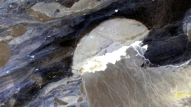 Giant jellyfish!? Unfortunately not, that’s called an alluvial fan and is a deposit of sediment at the mouth of a canyon.