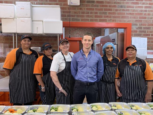 Rahni Duckford, Shanara Gibson, Jodie Tyler, Nathan Freeman, Robyn Caulthard and Isabell McKerlie during meal prep. Picture: Isaac Selby