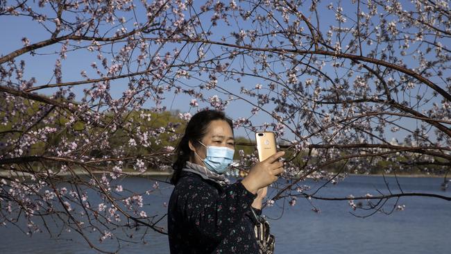 With spring comes a relaxation of China’s recent lockdown laws. Picture: AP/Ng Han Guan