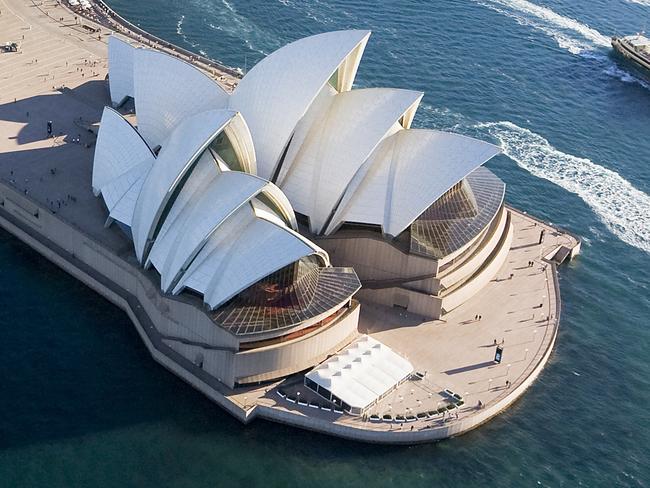 Aerial of Sydney and the Harbour foreshore including Opera House. Jet boat tours in foreground Image supplied by Destination NSW Mandatory Credit: Hamilton Lund/Destination NSW