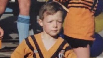 Damien Cook runs out for the Helensburgh Tigers.