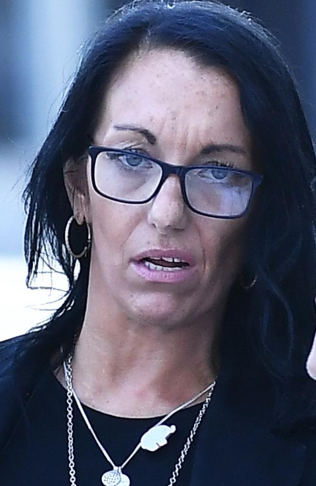 Kelly Liddicoat (black hair) leaves Maroochydore Court House. Picture: Patrick Woods.