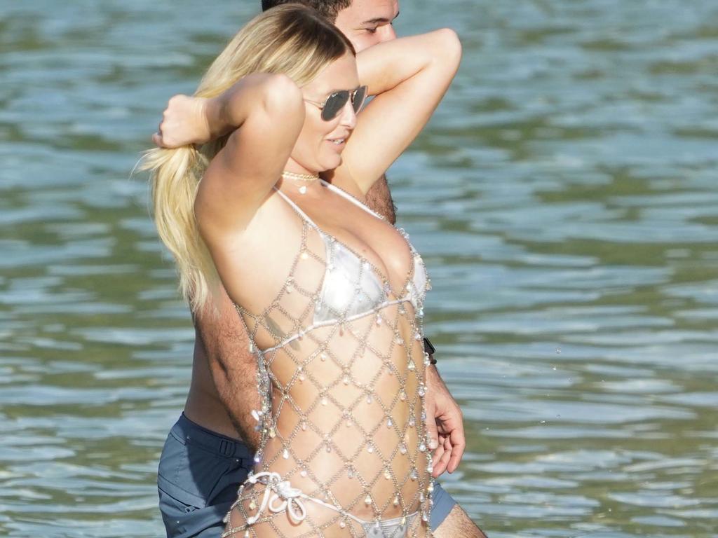 Golf champion Dustin Johnson And Fiancee Paulina Gretsky celebrate in the Caribbean. Photo: Splash News and Pictures.