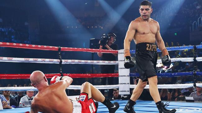 Leonardo Zapppavigna knocks down Danny Kennedy. Picture: Getty Images