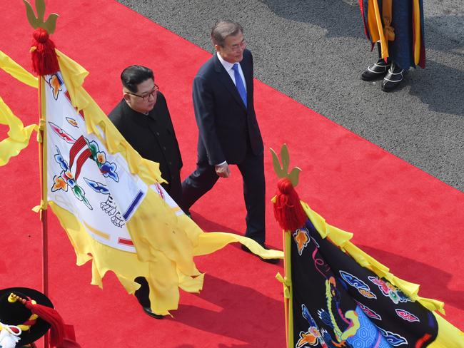 South Korean President Moon Jae-in and North Korean leader Kim Jong Un attend the official welcome ceremony ahead of the Inter-Korean Summit. Picture: Getty