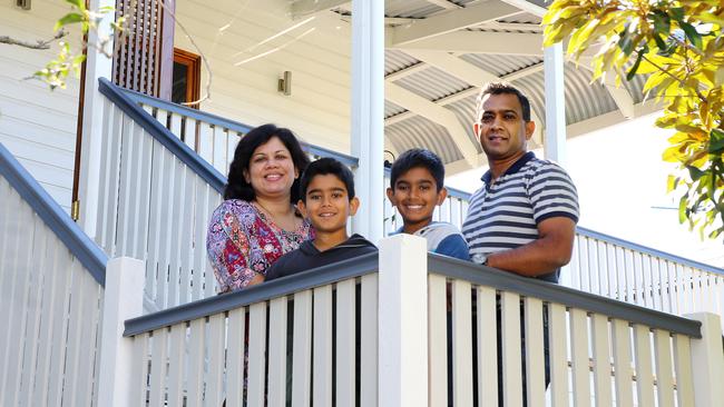 Chandima and Neil Priyantha with their children Dinidu, 9, and Chanuka, 11. Picture: Peter Cronin