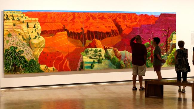 Crowds at the National Gallery of Australia in Canberra checking out the painting which will be making its way to the Gold Coast.