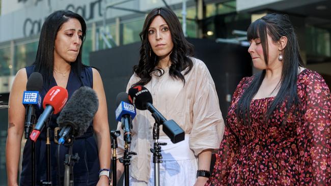 Sisters Elly Sapper, Dassi Erlich and Nicole Meyer outside Victorian County Court in Melbourne after the verdict on Monday. Picture: David Geraghty