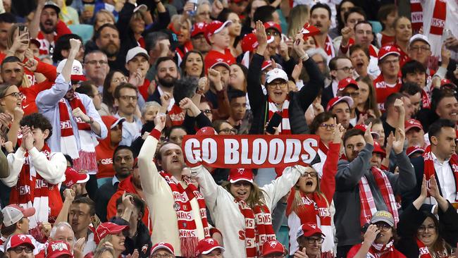 Swans fans celebrating the semi-final win that propelled them to the 2024 grand final against the Brisbane Lions. Photo: Phil Hillyard