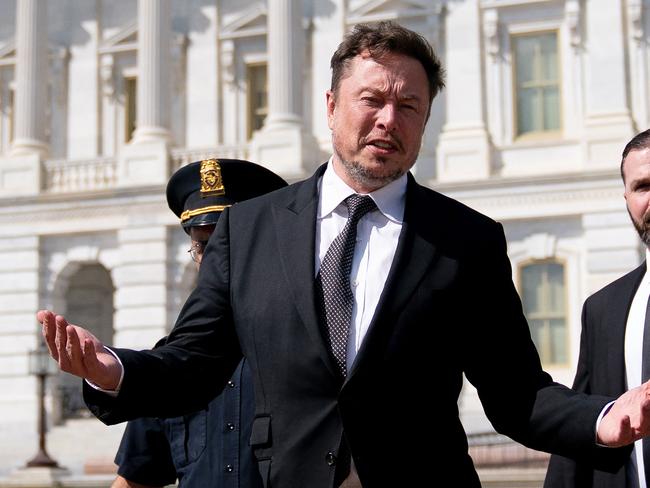 Elon Musk departs following a meeting in the office of US House Speaker Kevin McCarthy (R-CA), at the US Capitol in Washington, DC, on September 13, 2023. (Photo by Stefani Reynolds / AFP)