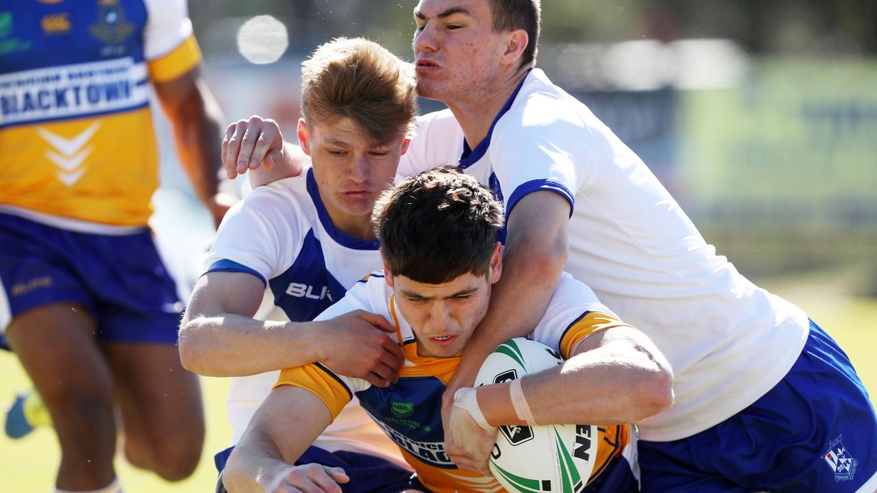 Sean Russell scores the first try for his team Patrician Brothers Blacktown in their NRL Schoolboy Cup match against St Dominic's College at Windsor Leagues Club. Picture: Jonathan Ng