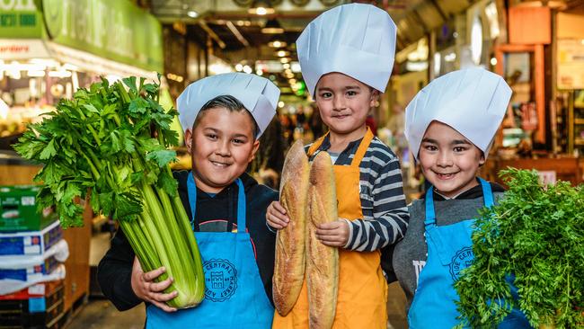 Little Foodies school holiday workshops at Centrals Market. Brothers Blake, 10, Hunter, 4, and Micah, 7, at the Central Market. Picture: AAP/Roy Vandervegt