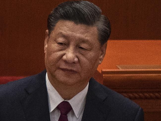 BEIJING, CHINA - APRIL 08: Chinese President Xi Jinping adjusts his jacket at a ceremony to honour contributions to the Beijing 2022 Winter Olympics and Paralympics at the Great Hall of the People on April 8, 2022 in Beijing, China. (Photo by Kevin Frayer/Getty Images)