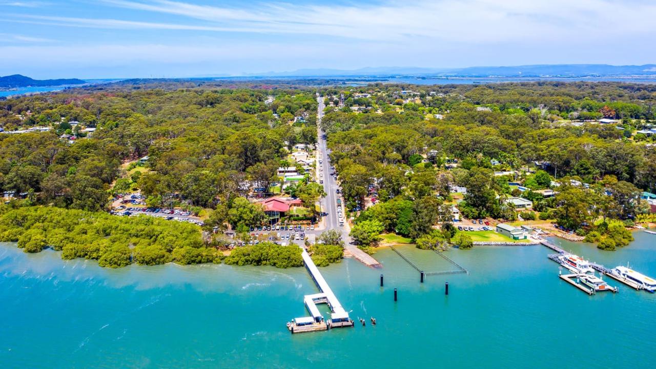 The man was found unresponsive in the water near the High St jetty on Russell Island. Picture: Supplied