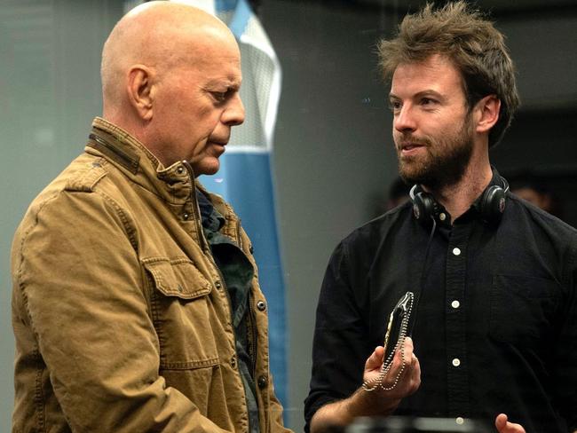 Australian director Edward Drake on set with Bruce Willis. Picture: Supplied