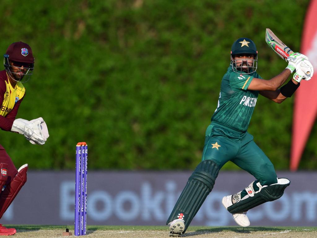 Pakistan’s captain Babar Azam (R) is Liz’s pick to finish the tournament as top run scorer. Aamir Qureshi/AFP