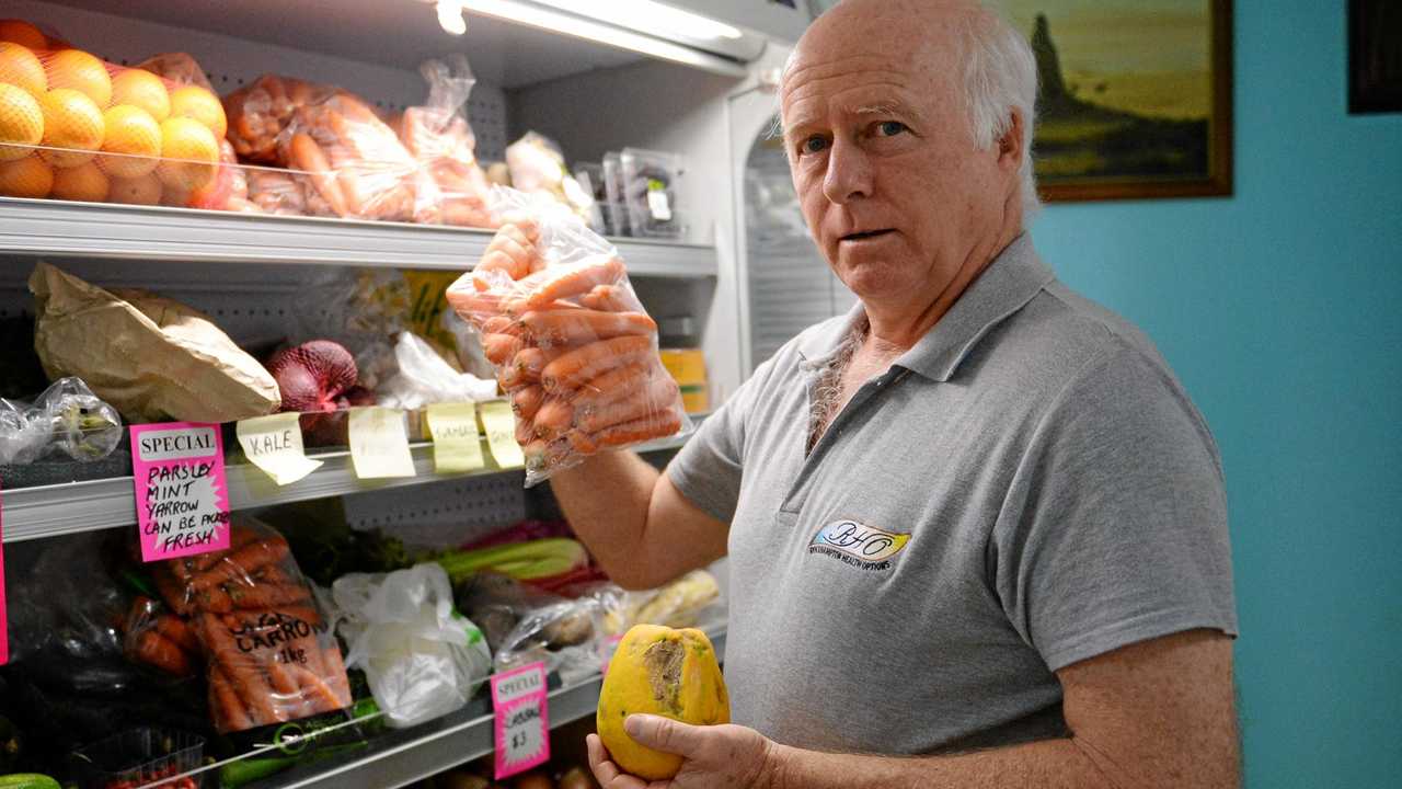 LIVING WELL: Naturopath Peter Lewis with some organic produce. Picture: Allan Reinikka ROK071113ahealth1