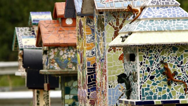 Big Picture. Strathewen letterbox art project providing mosaic letterboxes to fire affected residents.