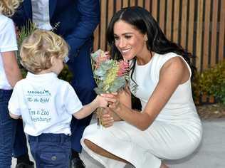 ROYAL WHITE: Meghan, the Duchess of Sussex, wears a dress designed by former Rockhampton woman Karen Gee. Picture: PETER PARKS