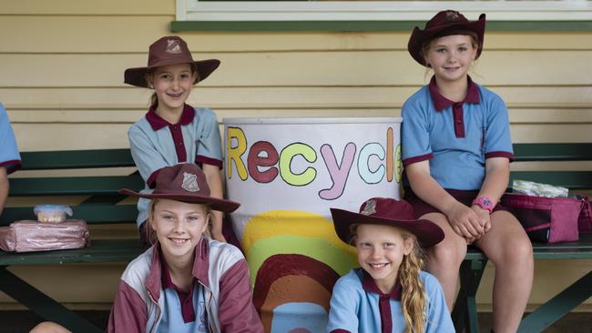 Tanduringie State School students with a recyling barrel they painted to collect containers. Photo/Contributed