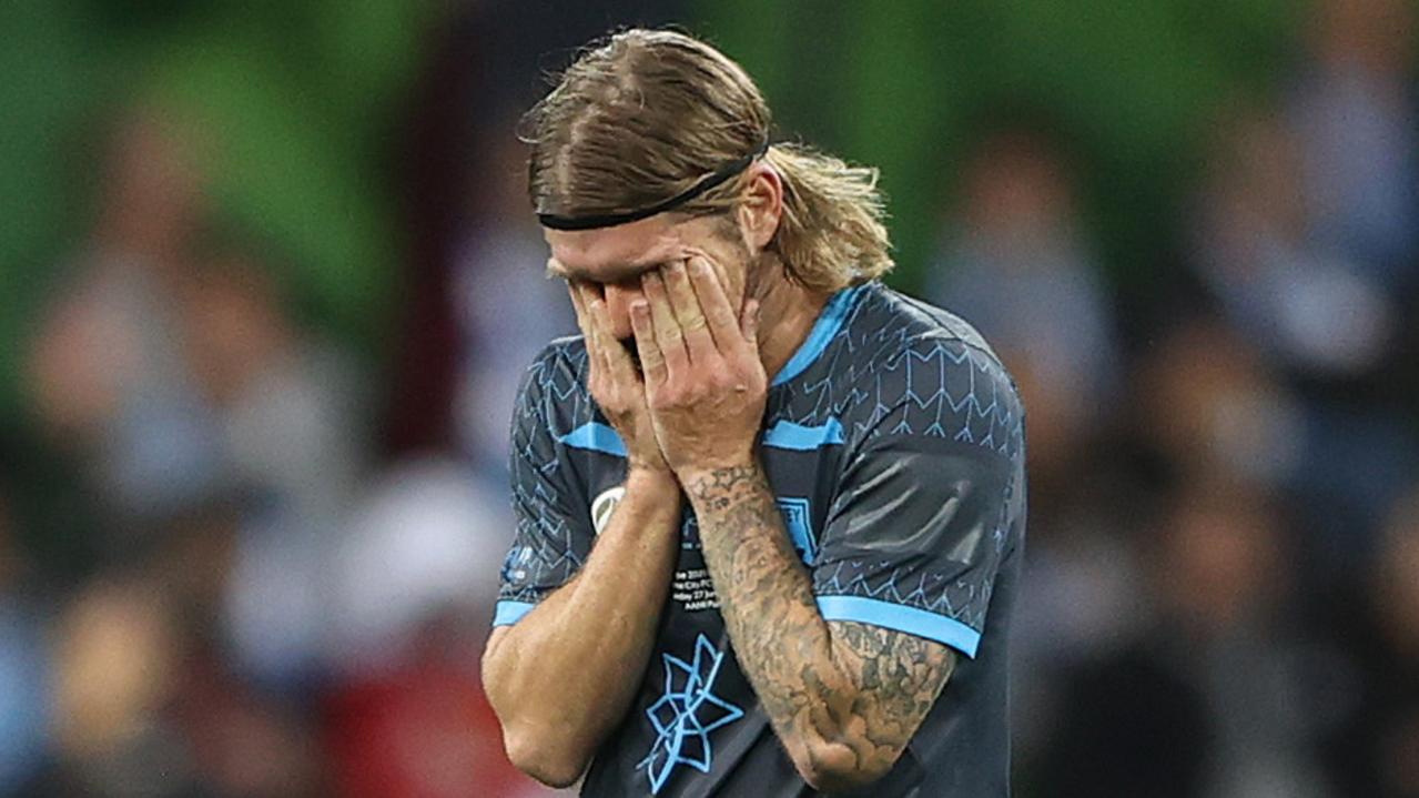 MELBOURNE, AUSTRALIA - JUNE 27: Luke Brattan of Sydney FC looks dejected as he leaves the field after being shown a red card during the A-League Grand Final match between Melbourne City and Sydney FC at AAMI Park, on June 27, 2021 in Melbourne, Australia. (Photo by Robert Cianflone/Getty Images)
