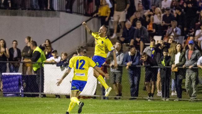 Broadbeach player Shaun Robinson celebrates with teammates. Picture: Jerad Williams