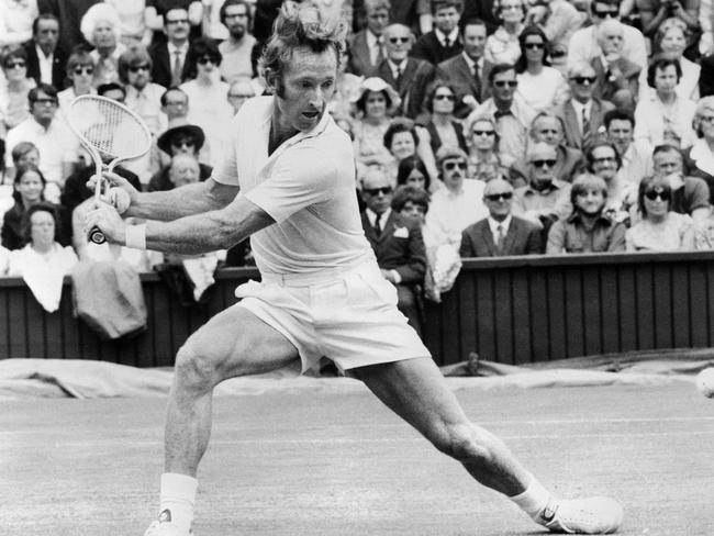 Rod Laver stretches to play a backhand return against Netherlands' Tom Okker during their men's singles match at the championships in Wimbledon in 1971. Picture: AFP