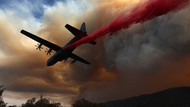 A C-130 aircraft drops fire retardant ahead of a wildfire in California in August. Picture: AFP