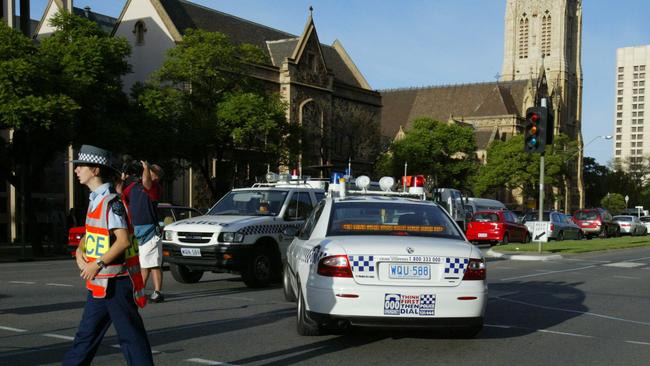 St Aloysius College students hit by car at intersection of Wakefield Street and Gawler Place, Adelaide. Police at scene 14 Mar 2003.