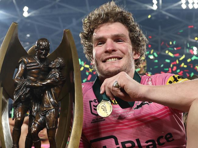 SYDNEY, AUSTRALIA - OCTOBER 06:  Liam Martin of the Panthers poses with the Provan-Summons Trophy after winning the 2024 NRL Grand Final match between the Melbourne Storm and the Penrith Panthers at Accor Stadium on October 06, 2024, in Sydney, Australia. (Photo by Cameron Spencer/Getty Images)