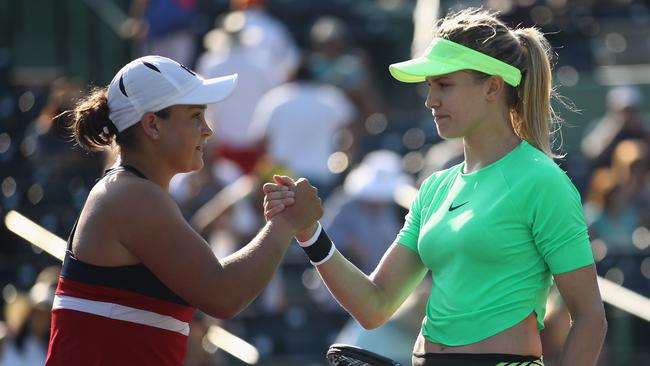 (R-L) Eugenie Bouchard of Canada congratulates Ashleigh Barty after the match.