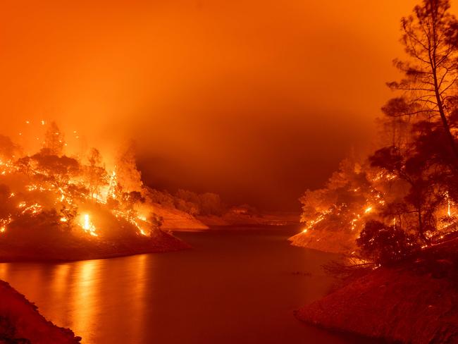 Flames consumes both sides of a segment of Lake Berryessa in Napa, California. Picture: AFP