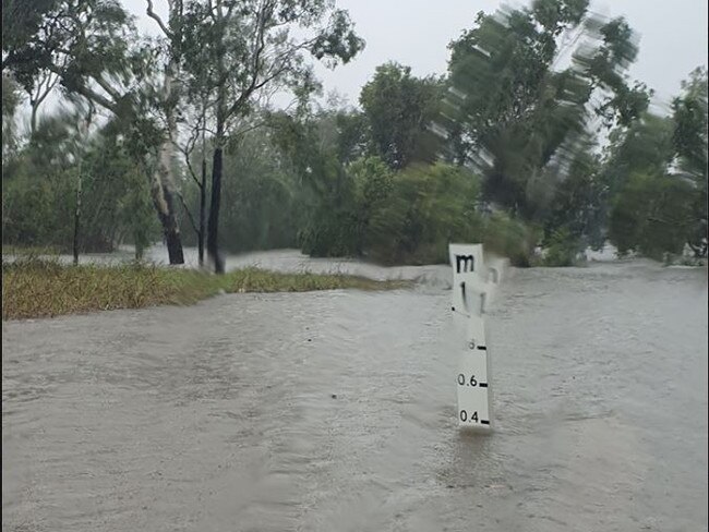 The flooded Bruce Highway in Home Hill yesterday. Photo: Graham Baker