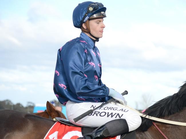 Ethan Brown returns to the mounting yard on Lobster Noodles after winning  the Bruce Carter Fencing BM58 Handicap at Sale Racecourse on July 25, 2021 in Sale, Australia. (Ross Holburt/Racing Photos via Getty Images)