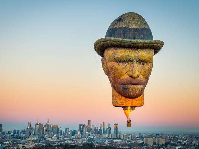 The Vincent van Gogh balloon takes flight over Melbourne in the lead-up to the King Valley Balloon Festival. Picture: Jake Nowakowski