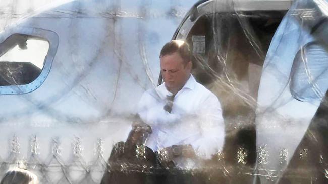 Premier Steven Miles and staff exit a private jet. Pic: Lyndon Mechielsen