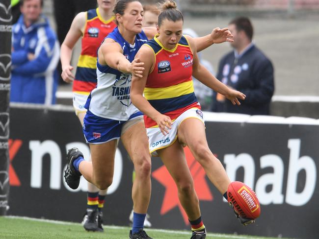 HOBART, AUSTRALIA - MARCH 07: Ebony Marinoff of the crows kicks the ball during the round five AFLW match between the North Melbourne Kangaroos and the Adelaide Crows at North Hobart Oval on March 07, 2020 in Hobart, Australia. (Photo by Steve Bell/Getty Images)