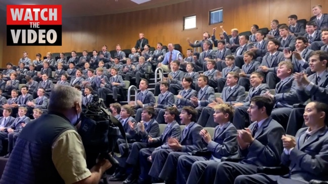 Churchie students cheer on Old Boy's gold medal race