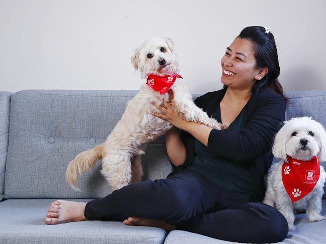 Sneha Shakya with dogs Arty and Lucky her adopted dogs at Wolli Creek today. Picture: Sam Ruttyn