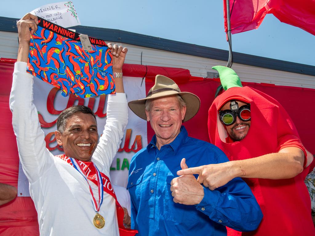 (From left) Winner of the Cracker’s Hot Chip Challenge, Feisal Abraham with Jim McDonald MP and Jace O’Connor at the Murphys Creek Chilli and Craft carnival. Sunday, September 22, 2024. Picture: Nev Madsen