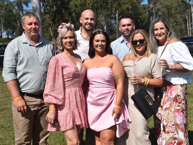 Brenton Giles, Ben Pickering, Luke Mostyn, Marina Giles, Teagan Divljak, Kylie List and Rachel Pickering at the Yeppoon race day at Keppel Park racecourse on April 26, 2025.
