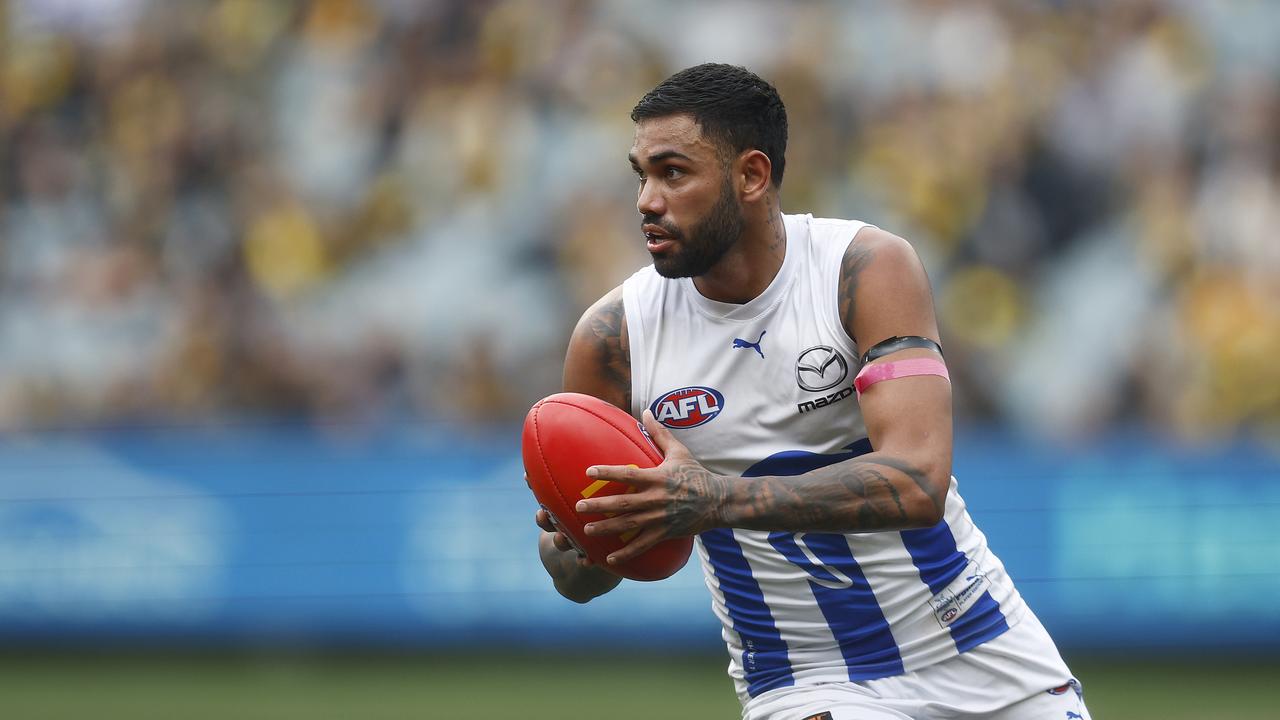 MELBOURNE, AUSTRALIA - AUGUST 19: Tarryn Thomas of the Kangaroos looks to pass the ball during the round 23 AFL match between Richmond Tigers and North Melbourne Kangaroos at Melbourne Cricket Ground, on August 19, 2023, in Melbourne, Australia. (Photo by Daniel Pockett/Getty Images via AFL Photos)