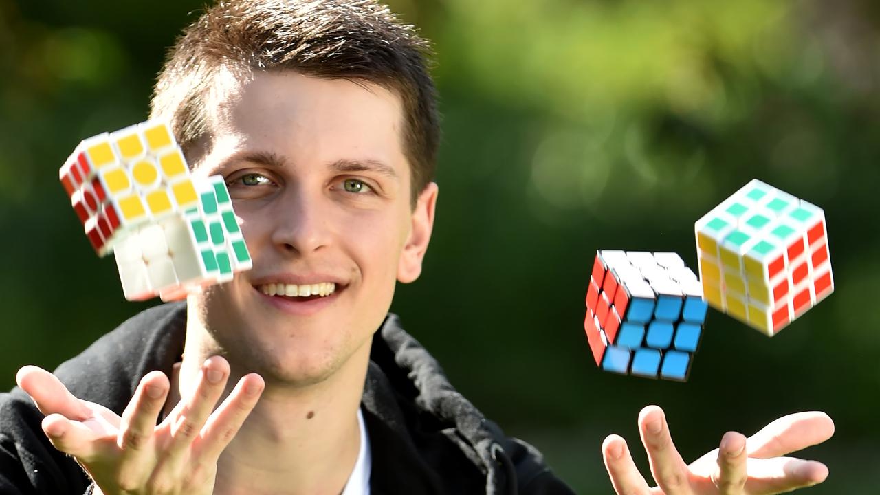 Teenager solves Rubik's Cube in 3.97 seconds, breaks record on camera