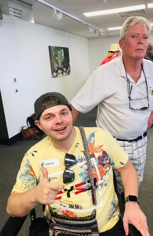 Gareth Aucock with his carer Peter Stewart. Picture: supplied