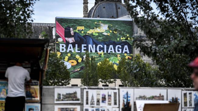 The Balenciaga billboard featuring Cardi B on the wall of the Louvre in Paris. Picture: Stephane De Sakutin / AFP